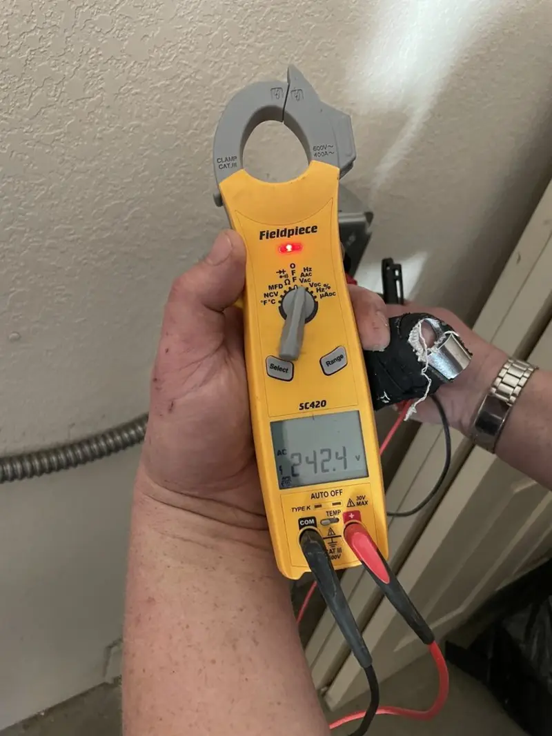 Voltage testing with clamp meter during Generator Installation in Portage